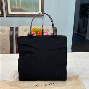Authentic Gucci Black tote bag with metal straps